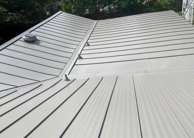 Solar attic fan installed on a metal roof for Roof Ventilation in Boyes Hot Springs